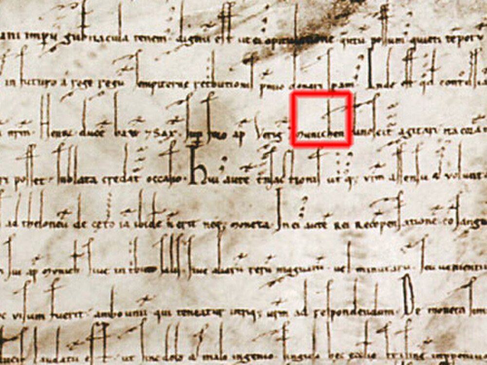 Middeleeuws Latijns Manuscript met Gemarkeerde Tekst Oud middeleeuws manuscript met Latijns schrift en gemarkeerd gedeelte met historische handgeschreven tekst op perkament.