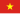 Rode vlag met een grote gele ster in het midden, symboliserend de nationale vlag van Vietnam, die patriottisme en eenheid vertegenwoordigt.